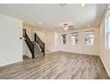 Bright living room with hardwood floors and multiple windows for natural light at 2862 Starling Summit St, Henderson, NV 89044