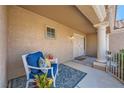 Cozy front patio area with stylish outdoor seating, creating a welcoming and relaxing ambiance at 3012 Haddon Dr, Las Vegas, NV 89134