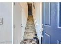 Home entryway featuring stairway, showing the interior design and access point at 7360 N Decatur Blvd # 1, Las Vegas, NV 89131