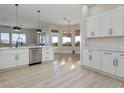 Spacious kitchen with white cabinetry, stainless steel appliances, and an open floor plan at , Las Vegas, NV 89134