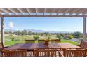 Inviting outdoor patio space with a large table and chairs, perfect for entertaining with scenic views at , Las Vegas, NV 89134