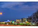 Commercial building and blue light tents with trees at 11178 Corsica Mist Ave, Las Vegas, NV 89135