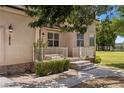 Quaint single-Gathering home with stone accents, meticulous landscaping, and cozy front porch at 1470 St Joseph St, Overton, NV 89040