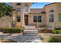 Welcoming front door with a wreath and decorative landscaping, inviting you into your next home at 1470 St Joseph St, Overton, NV 89040