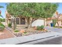 Charming single-story home with a well-maintained yard and a two-car garage at 314 Abbington St, Henderson, NV 89074