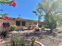 Charming single-story home boasting mature landscaping and serene front yard space at 4420 Avondale Ave, Las Vegas, NV 89121