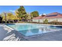 Community swimming pool with sparkling blue water at 611 Spyglass Ln, Las Vegas, NV 89107