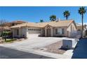 Charming single-story home with a tile roof, desert landscaping, and an attached two-car garage at 6508 Alpine Forest Ct, Las Vegas, NV 89149