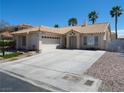 Charming single-story home with a tile roof, desert landscaping, and an attached two-car garage at 6508 Alpine Forest Ct, Las Vegas, NV 89149