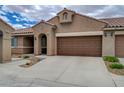 Charming single-story home with a two-car garage and beautiful desert landscaping at 9431 Borough Park St, Las Vegas, NV 89178