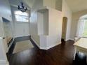 Inviting entryway featuring high ceilings, a large window, and a convenient coat rack with storage at , Las Vegas, NV 89129