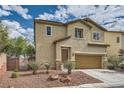 Charming exterior view showcasing desert landscaping, a two-car garage, and a warm neutral color scheme at 10513 Bandera Mountain Ln, Las Vegas, NV 89166
