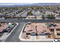 Aerial view of a neighborhood showcasing well-maintained homes and streets at 1301 Nugget Creek Dr, Las Vegas, NV 89108
