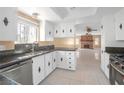 Classic kitchen with stainless steel appliances and an open layout to the living area at 3558 Wayne Cir, Las Vegas, NV 89121