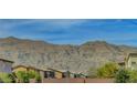 Scenic mountain view from a neighborhood home with great landscaping at 6830 Compass St, North Las Vegas, NV 89084