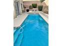 Relaxing backyard featuring a pool and spa, perfect for outdoor enjoyment at 10680 Sapphire Vista Ave, Las Vegas, NV 89144
