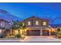 Charming two-story home with a three-car garage and well-manicured landscaping at 2248 Verde Cape Ave, Henderson, NV 89052