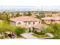 Two-story home features a well-manicured front yard and desert landscaping at 366 Rancho La Costa St, Las Vegas, NV 89138