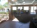 Community gym with treadmills, ellipticals, and weight equipment at 5488 Apron Ct, Las Vegas, NV 89122