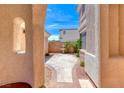 Picturesque courtyard featuring a charming fountain and serene landscaping, offering a peaceful retreat at 11275 Gammila Dr, Las Vegas, NV 89141