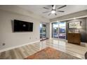 Cozy bedroom with ceiling fan, neutral paint, and Las Vegas city views through bright windows at 150 Las Vegas Blvd # 1507, Las Vegas, NV 89101