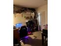 Cozy bedroom with ample storage shelves and an organized closet, offering practical living space at 1676 Divinity St, Las Vegas, NV 89142