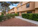 Charming condo exterior with manicured landscaping, offering curb appeal at 2851 S Valley View Blvd # 1132A, Las Vegas, NV 89102