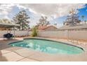 Backyard oasis showcasing a private pool with mature trees at 4666 Plata Del Sol Dr, Las Vegas, NV 89121