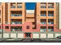 Exterior view of building with private garage and main entrance at 55 E Agate Ave # 202, Las Vegas, NV 89123