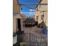 View of backyard featuring gravel, old truck, shed, and air conditioning units at 6429 Rosemount Ave, Las Vegas, NV 89156