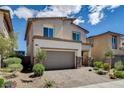 Charming two-story home with a low maintenance yard and inviting curb appeal at 8898 Sasquatch Run Ave, Las Vegas, NV 89166