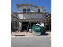 Construction of a modern two-story home with scaffolding and a two-car garage at 9094 Rivington Ave, Las Vegas, NV 89148