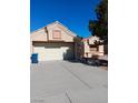 Charming single-story home featuring a two-car garage and a well-maintained gravel yard at 9312 Yucca Blossom Dr, Las Vegas, NV 89134