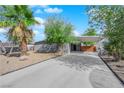 Charming single-story home with a spacious driveway and well-maintained landscaping at 942 Westminster Ave, Las Vegas, NV 89119