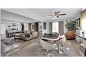 Open-concept living room with modern furnishings and plenty of natural light at 942 Westminster Ave, Las Vegas, NV 89119