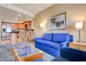 Comfortable living room features a sleek wet bar, cozy seating, and modern decor at 211 E Flamingo Rd # 620, Las Vegas, NV 89169