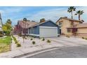Charming single-story home featuring a two-car garage and low-maintenance desert landscaping at 4205 Caliper Dr, Las Vegas, NV 89110