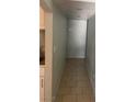 Hallway with tile floors and neutral paint at 4626 Sacks Dr, Las Vegas, NV 89122