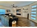 Living room features a decorative fireplace with a mounted TV and stylish furniture at 600 N Carriage Hill Dr # 1082, Las Vegas, NV 89138