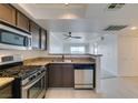 Well-equipped kitchen featuring stainless steel appliances and granite countertops at 8070 W Russell Rd # 2026, Las Vegas, NV 89113