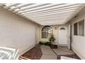 Cozy covered front porch with decorative brick accents and white trim at 3510 Judah Way, Las Vegas, NV 89147