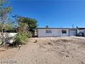 This single-story home features desert landscaping with potential and an attached one-car garage at 4808 Everman Dr, Las Vegas, NV 89122
