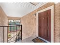 The doorway shows the entrance to Unit 424, near a staircase and an open outdoor space at 5020 Indian River Dr # 424, Las Vegas, NV 89103