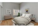 Cozy bedroom has wood floors and lots of natural light at 8450 Alta Dr # 220, Las Vegas, NV 89145