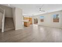 Bright living room featuring hardwood floors, a ceiling fan, and natural light at , Las Vegas, NV 89149