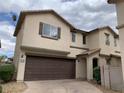 Charming two-story home with a convenient two-car garage and neutral color palette at 10238 Missouri Meadows St, Las Vegas, NV 89183