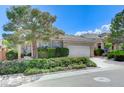 Charming single-story home with a two-car garage and well maintained landscaping at 10389 Walking View Ct, Las Vegas, NV 89135