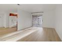 Spacious, bright living area with sliding glass doors and modern flooring at 4310 Sandy River Dr # 70, Las Vegas, NV 89103