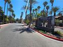 Elegant entrance with lush greenery and community signage at Sedona at 9000 Las Vegas Blvd # 2061, Las Vegas, NV 89123