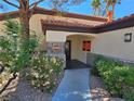 Office entrance with tasteful landscaping and well-maintained walkway at 9000 Las Vegas Blvd # 2097, Las Vegas, NV 89123